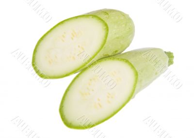 Two half of young vegetable marrow