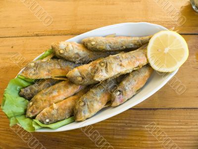 fried fish with a lemon
