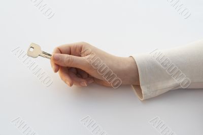 hand holding key