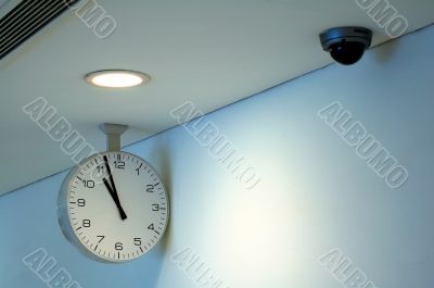 Clock and security camera