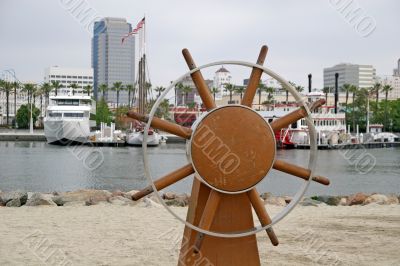 Ships Wheel on Beach