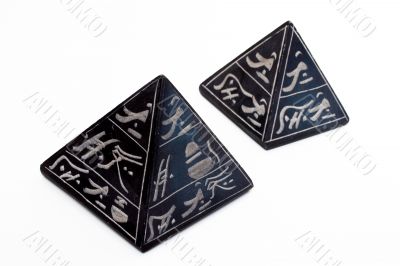 Two Black pyramid on a white background