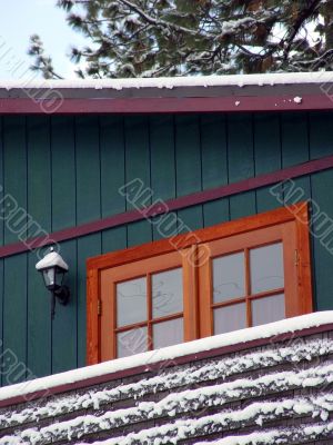 Cabin in a snow wood