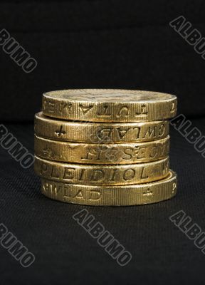 british coins over black