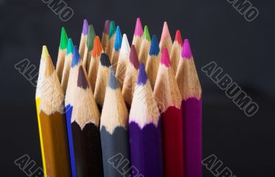 color pencils on black