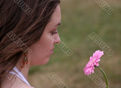 admiring a beautiful flower - girl sally