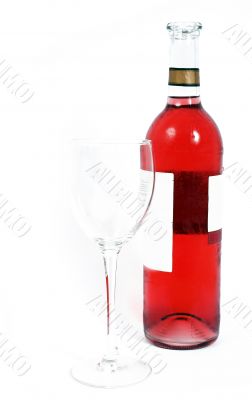Bottle of red wine and glass