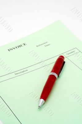 Blank invoice with pen