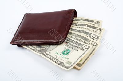 Old leather wallet with bills inside