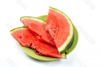 Watermelon slices on the green plate