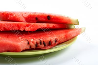 Watermelon slices on the green plate