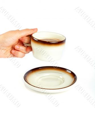 Holding the coffee cup