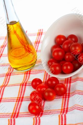 Oil bottle and tomatos cherry