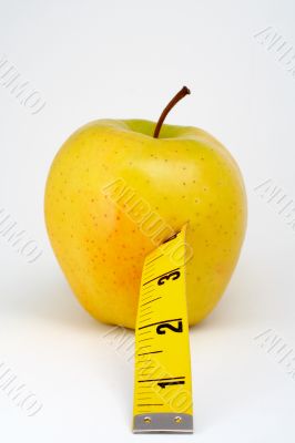 Apple with tape measure