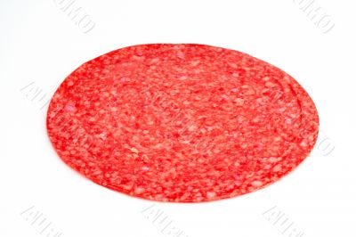 Salami slice closeup isolated