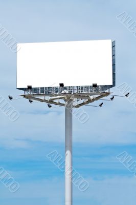 Blank billboard on cloudy sky