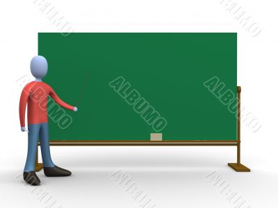 Teacher in front of a blackboard.