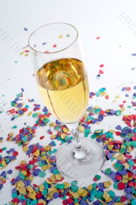 Champagne glass and confetti
