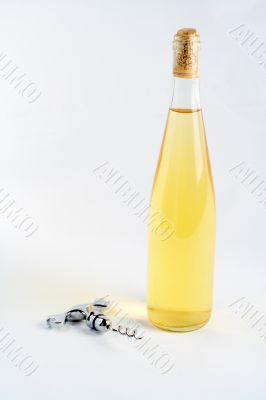 Corkscrew and bottle of wine
