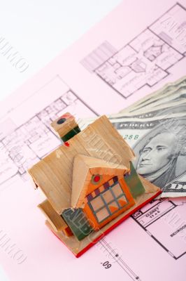 House and dollar bills