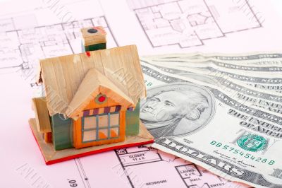 House and dollar bills