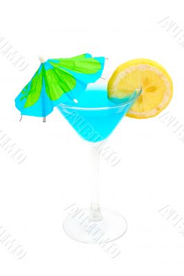 Blue cocktail with lemon and umbrella