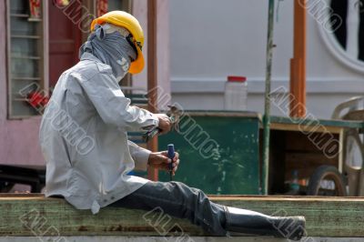 malaysian worker under the sun