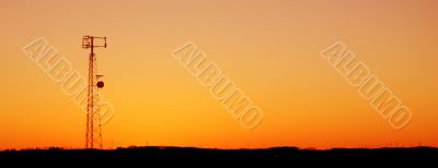 Orange Cell Tower Silhouette