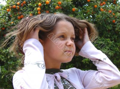 The girl correcting hair