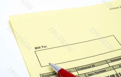 Close up Blank invoice with pen