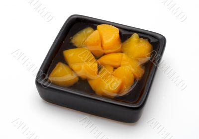 Fresh fruit salad on the black bowl