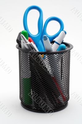 Basket with various office items
