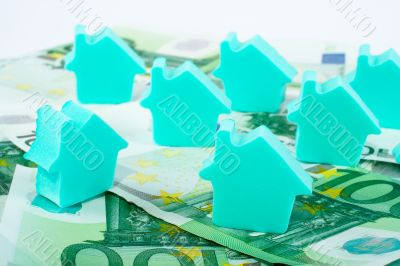House on money background