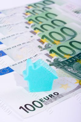House on money background