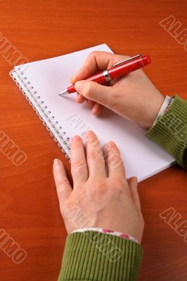 Business woman writing