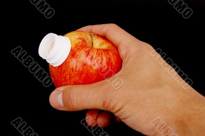 holding apple with spout