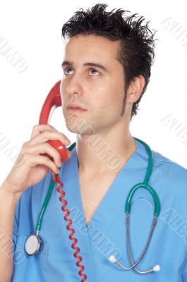 doctor speaking on the telephone