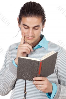 attractive boy reading a book