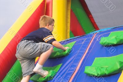Boy Playing On Obstacle Course