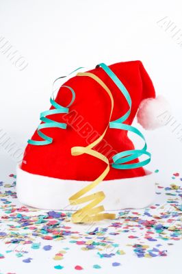 Christmas hat with ribbons and confetti