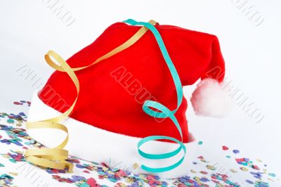 Christmas hat with ribbons and confetti