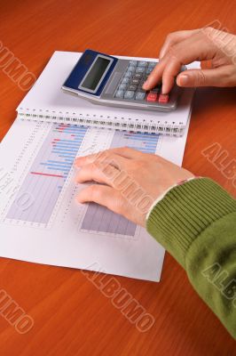 Business woman calculating