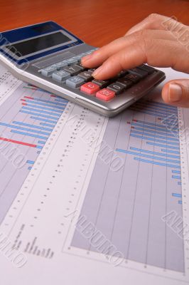 Business woman calculating