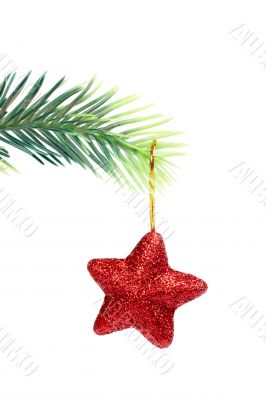 Star hanging from Christmas tree