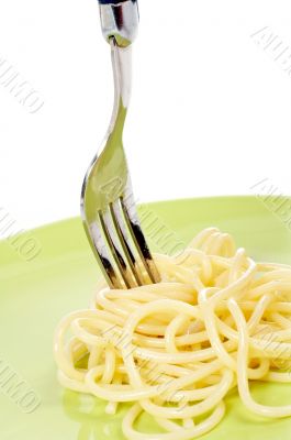 Rolled spaghetti on a fork
