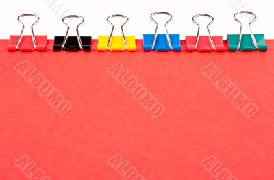 Colored paper clips lined up