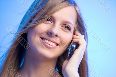 smiling beauty talking on the phone