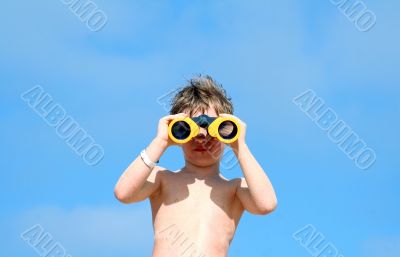 child with spyglasses