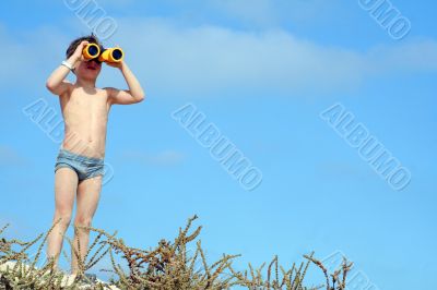 child with spyglasses