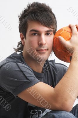 man with orange ball